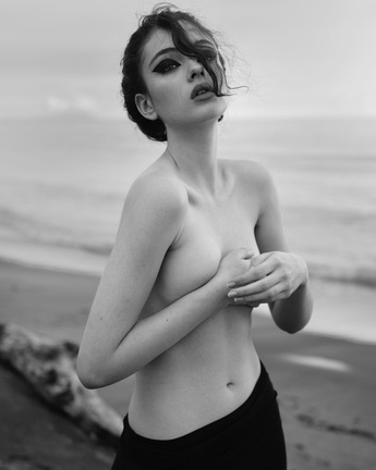 Deva Cassel goes topless